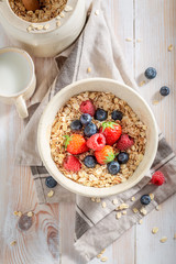 Healthy granola with berry fruits for breakfast