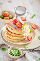 Tasty american pancakes for breakfast on white table