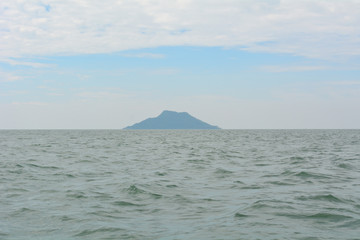 Summer landscape with sea and mountain range with sky, Beautiful tropical Thailand island.