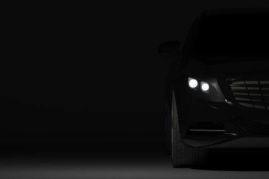 Fototapeta Front view part of black modern car closeup on black background, headlights detail - 3d illustration