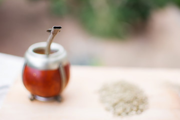Bombilla, mate, mate grass (yerba mate) blurred