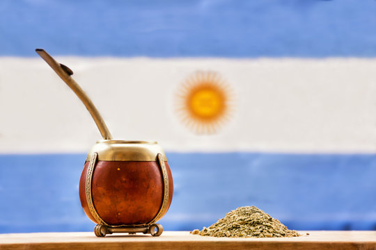 mate, mate grass (yerba mate) with flag of Argentina  in the background