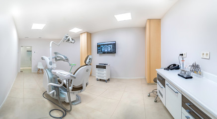 Fototapeta na wymiar Panorama of a clean white modern dentist cabinet. Spacious room. Dental care concept.
