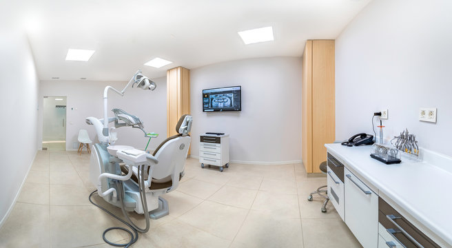 Panorama of a clean white modern dentist cabinet. Spacious room. Dental care concept.