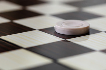 Obraz na płótnie Canvas Checkerboard with checkers. Game concept.