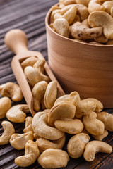 cashew nuts on a rustic wooden background