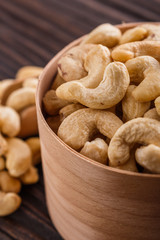 cashew nuts on a rustic wooden background