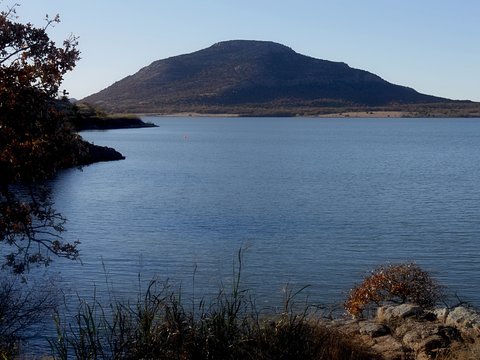 Scenic view of Lake Lawtonka with the 2,464-foot Mt. Scott in the background in the Comanche County of Oklahoma. 