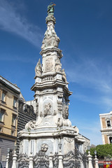Fototapeta na wymiar Guglia dell'Immacolata obelisk in Naples, Italy