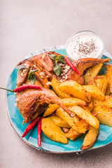 Roasted quails with potatoes