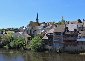 Fototapeta premium Saint Benoit church in historic city of Argenton sur Creuse called the Venice of Berry, Berry region - Indre, France