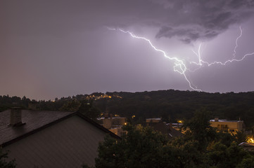 Lightning strike above the city park