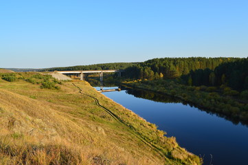 Fototapeta na wymiar landscape with river, bridge over the river