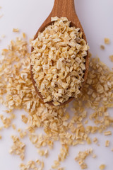 fragrant dried parsnip on a white acrylic background