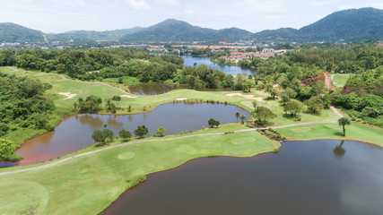 Fototapeta na wymiar aerial view drone shot of golf course.