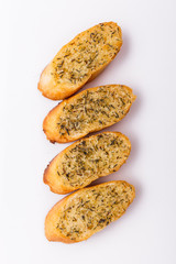 fragrant garlic bread on a white acrylic background