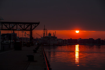 Fototapeta premium sunset in port of rostock germany