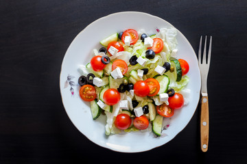 Greek salad on dark background