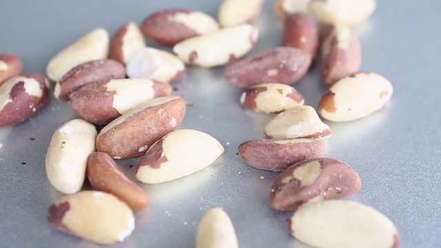 group of brazil nuts on a rotating plate
