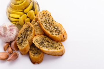fragrant garlic bread on a white acrylic background