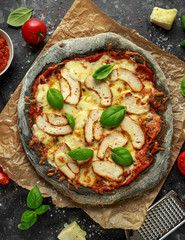 Stone Baked Black Pizza with chicken, tomato and mozzarella cheese