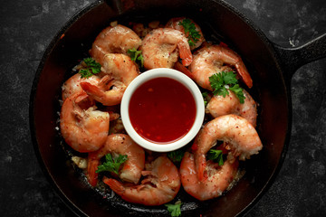 Fried in garlic butter shrimps served with sweet chili suace and parsley