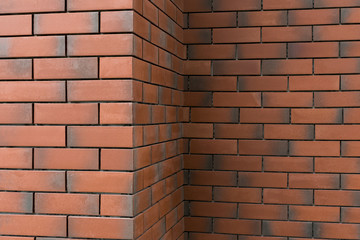 Corner of red brick wall texture with empty space for copy or text. Background