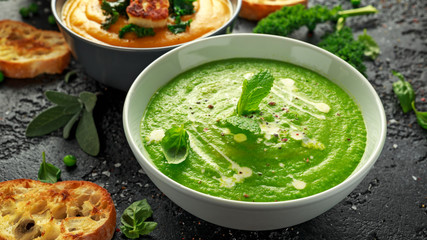 Variety of cream soup bowls: sweet pea and mint, tomato and basil and butternut squash with steamed kale and fried halluomi