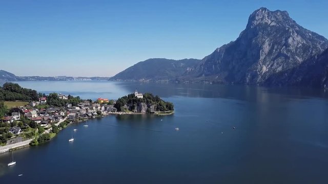 Flight around Traunkirchen church on Traunsee lake, in Salzkammergut, Upper Austria.