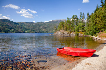 Fototapeta na wymiar Moored boat at Lake in Norway