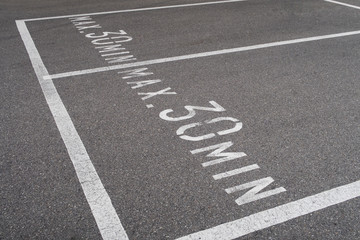 Parking lot in Switzerland: maximal parking time is 30 minutes