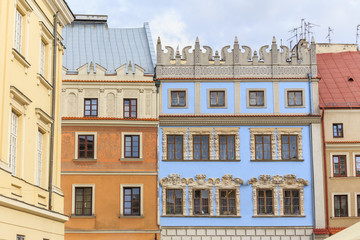 Historic tenement House Rynek 12 ( in the middle) in Lublin, with azure facade,  so-called  Konopnicow House, with mannerist decoration of  front elevation, from XVI th centuru - obrazy, fototapety, plakaty