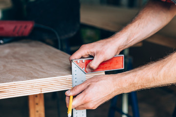 carpenter hands on working in his workshop