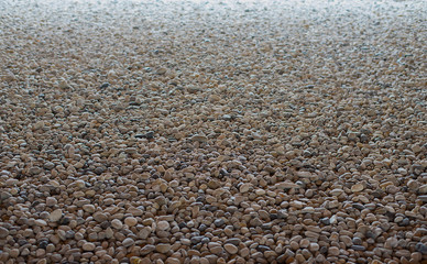 Perspective style, natural pebbles in dense brown tones.