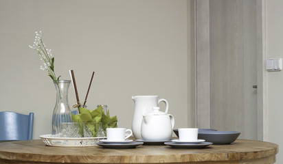Breakfast table with white porcelain