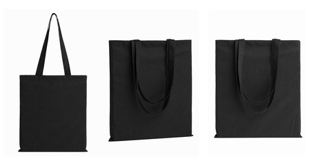 set of bags made of black cotton fabric, isolated on white background
