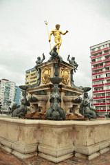 Fototapeta na wymiar Golden fountain Neptune at Theather square, Batumi Georgia
