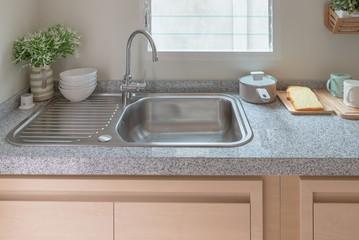 sink with faucet in kitchen room