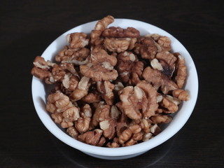 Dry fruits , walnuts akhrot against white background,Walnuts - Walnuts in black background, Walnuts On White Background, Akhrot in White Bowl on Wooden Background,