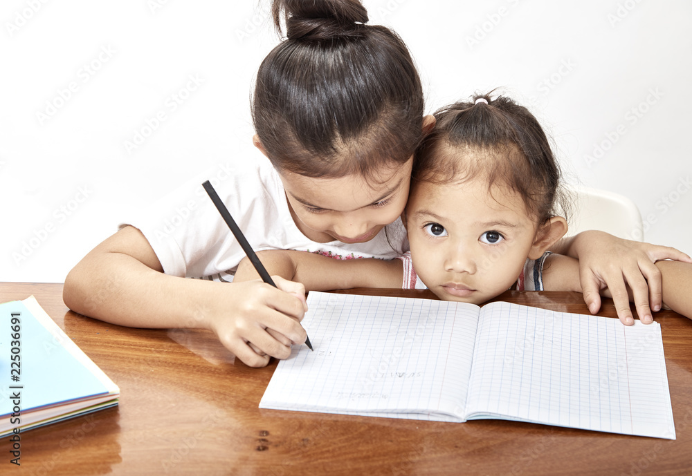 Wall mural two little girls thai homework