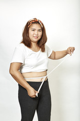 Fat woman with measure tape