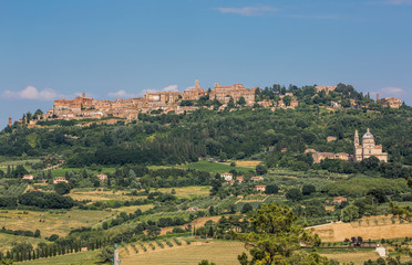 Fototapeta na wymiar Panoramic view of the San Biagio church and hilltop town of Montepulciano in Tuscany, Italy