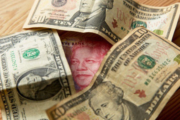 A rand to the dollar currency exchange concept image.