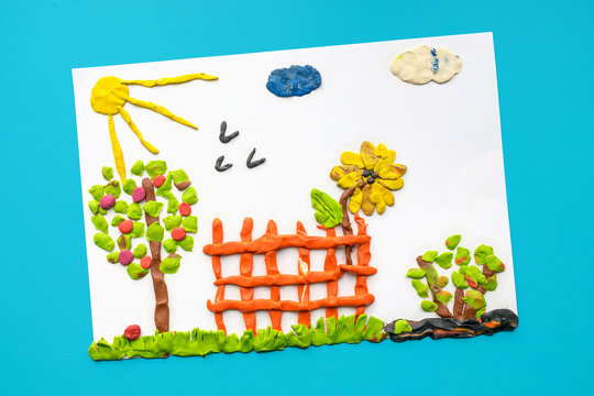 Children's modelling clay crafts. Bright summer Landscape with trees,  grass, fence, sun and clouds of plasticine. Children's creativity, sensory  finger games, Stock Photo | Adobe Stock