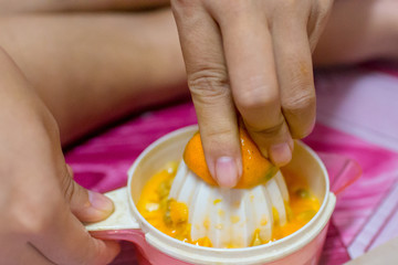 Crush orange fruit to drink water.