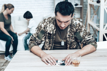 Man Is Drinking Alcohol. Depression After War.