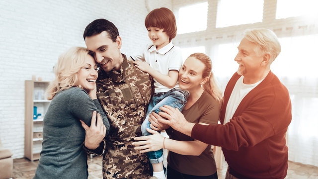 A Man Returns From The Military. Family Meeting.
