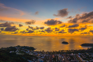 aerial panorama sunrise at Kata beach close to Karon beach in the middle of two beach has Pu island.