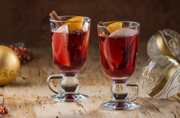 Mulled wine with nuts and spices. Selective focus.