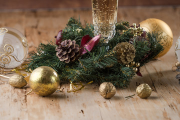Champagne flutes with golden bubbles make cheers on colorful light bokeh